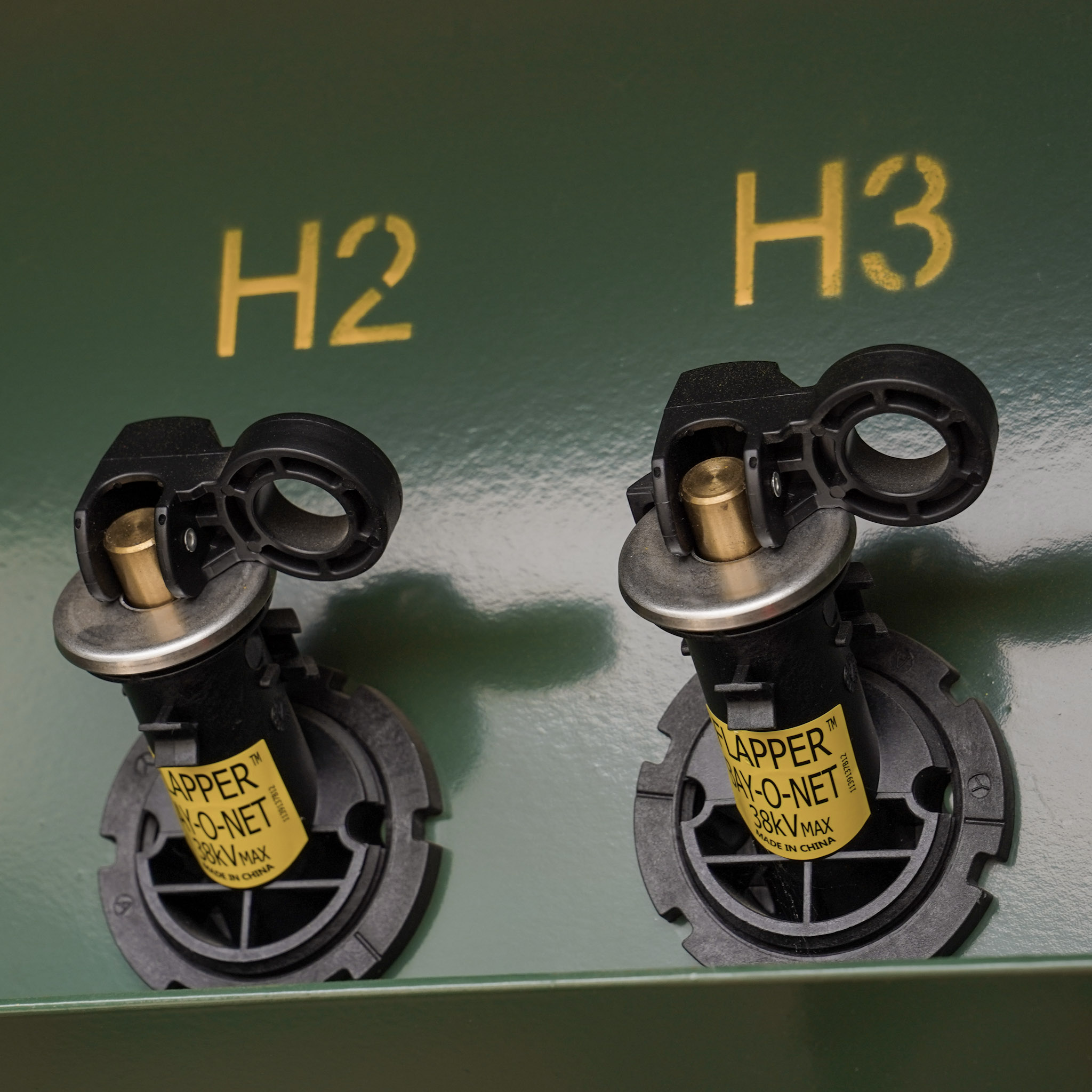 Bay-O-Net fuse holders on a padmount transformer