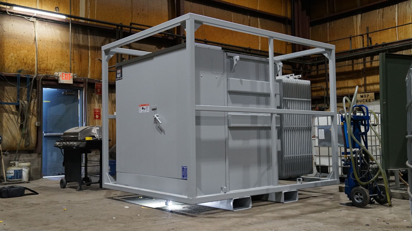 A caged rental transformer in the JCL shop
