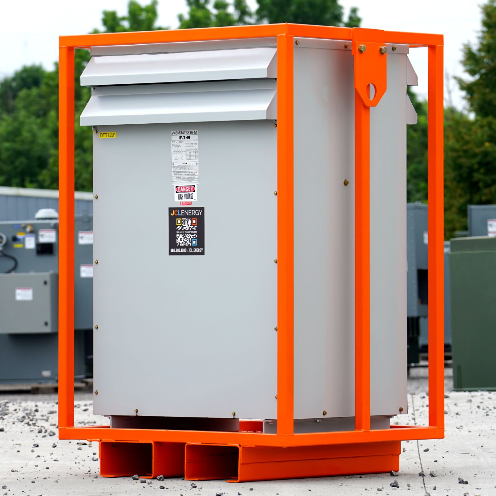 A dry-type rental transformer in a JCL orange transport frame