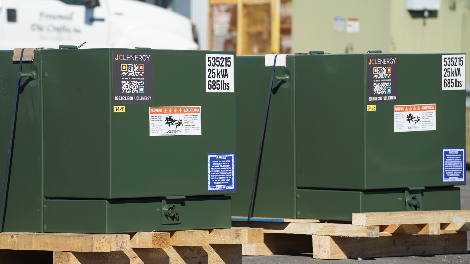 JCL padmount transformers staged on pallets